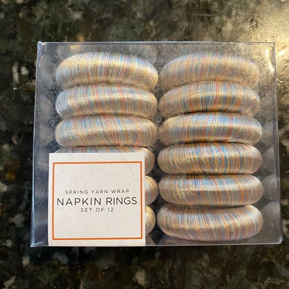 NEW still in package and never opened! Spring Yarn Wrap Napkin Rings Set of 12